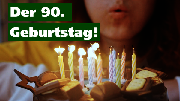 Ankündigungsbild Kind mit Geburtstagstorte zum 90. Geburtstag Verband Wohneigentum